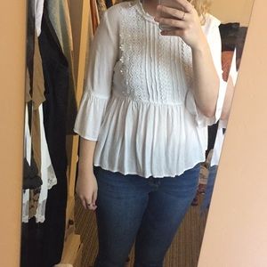 White blouse with embroidered design